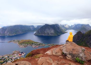 Male Tourist Sitting On Th