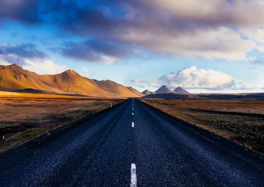 Empty Road by Mountains