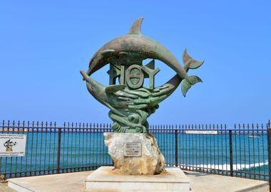 Rethymno dolphins statue