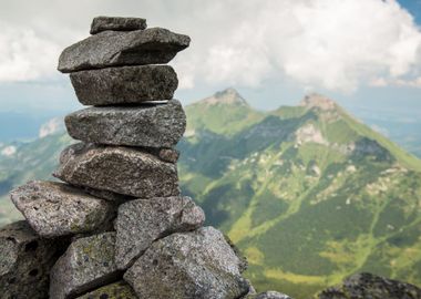 Stack Of Rocks Cloudy Moun