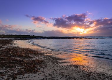 Beach scene at sunset