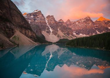 Mountains reflect in water