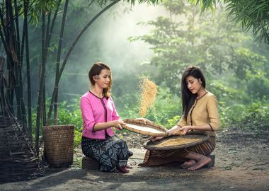 Yong women sifting 