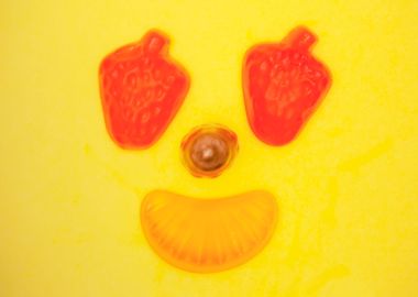 Fruit face smiling strawbe