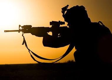 Silhouetted men in Combat