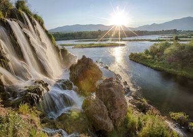 Waterfall by the Mountains