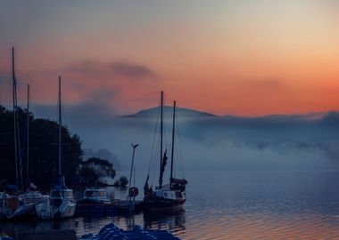 Autumn misty lake, sunrise