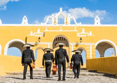 Mariachi musicians walking