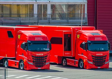 Two trucks in the pits