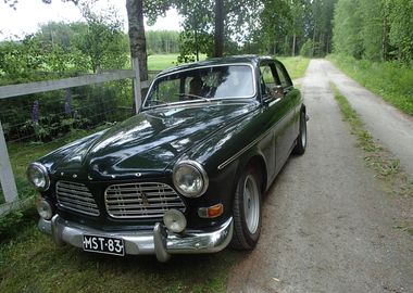 Green Volvo 140 Series