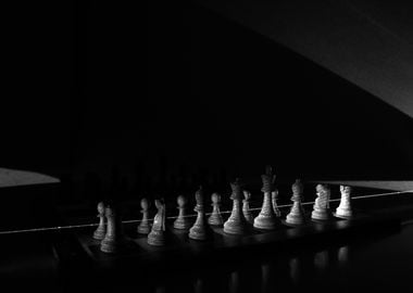 Chess Pieces Illuminated by a Laser