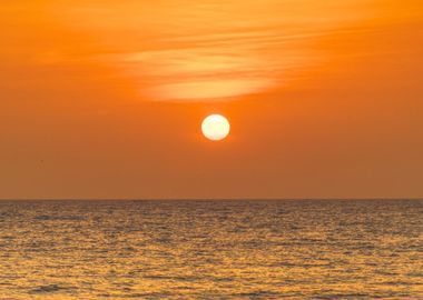 a circle, a bit of water,  some cloud brushes. The perfect sunset, only in Senegal