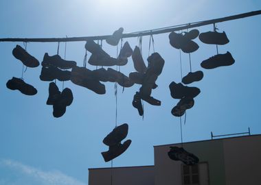 Shoes Hanging on Wires