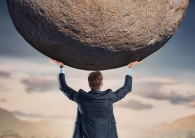 Businessman Lifting Boulder