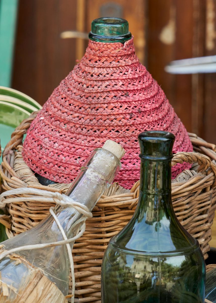 'old empty wine bottles in ' Poster by Ornella Bonomini Displate