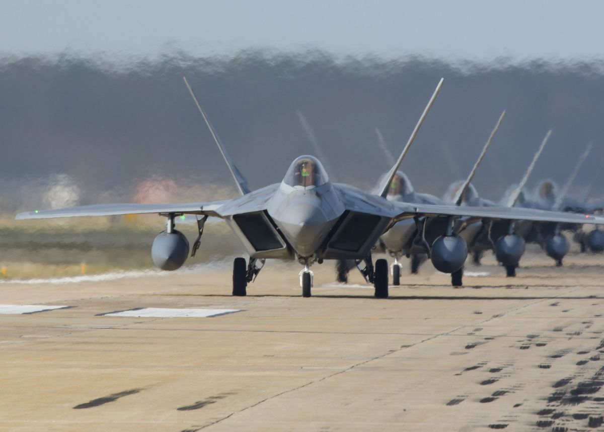 'Line up of F22 Raptors' Poster by Galaxy Images | Displate