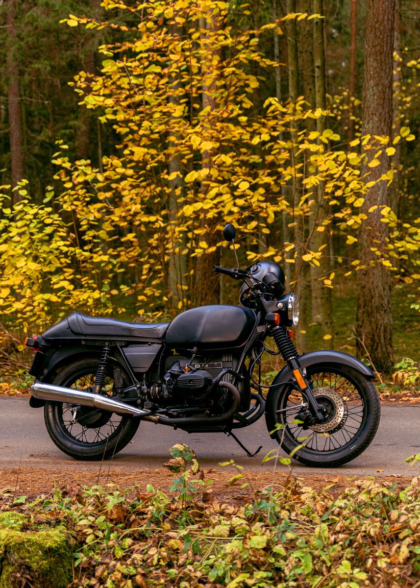 Motorcyclist With Motorcycle Retro Cafe Racer On Autumn Road In